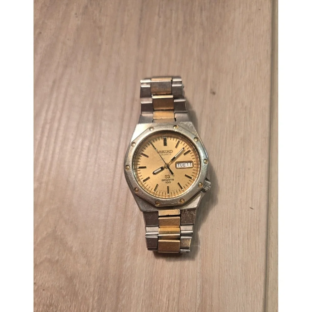 Seiko Watch Men SQ Sports 100 Vintage Silver Gold Stainless St WR Battery Quartz